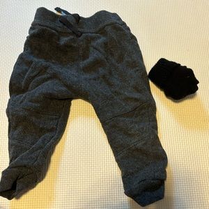 Baby joggers and black gloves